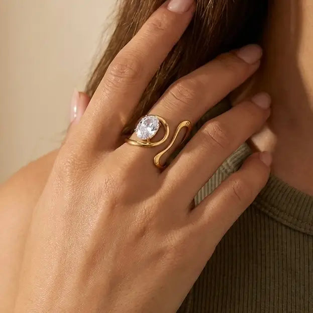 Anello "Fluid Solitaire", Anello Aperto Donna Acciaio Inox Regolabile Design Fluido con Solitario Ovale Oro e Argento