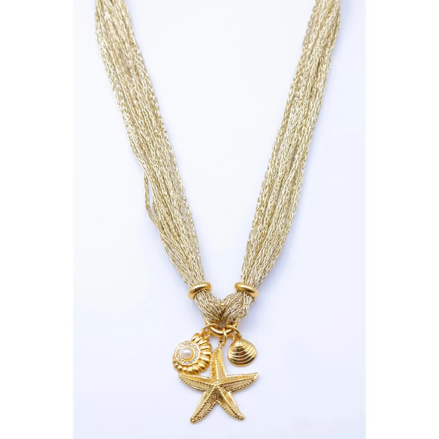 Collana "Incanto Marino" – Collana Multifilo Dorata in Acciaio Inossidabile con Pendente Stella Marina e Conchiglie