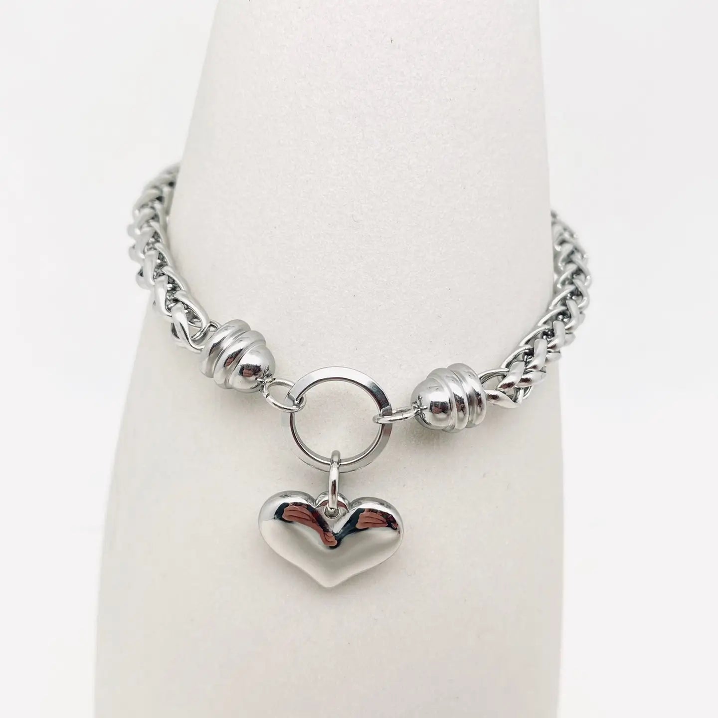 Bracciale "Cuore Intrecciato" in Acciaio Inossidabile – Eleganza e Resistenza