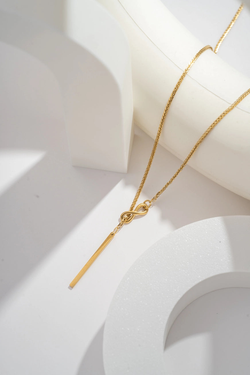 Collana Nodo Eterno in acciaio inossidabile oro/argento – collana minimal con pendente nodo e barra