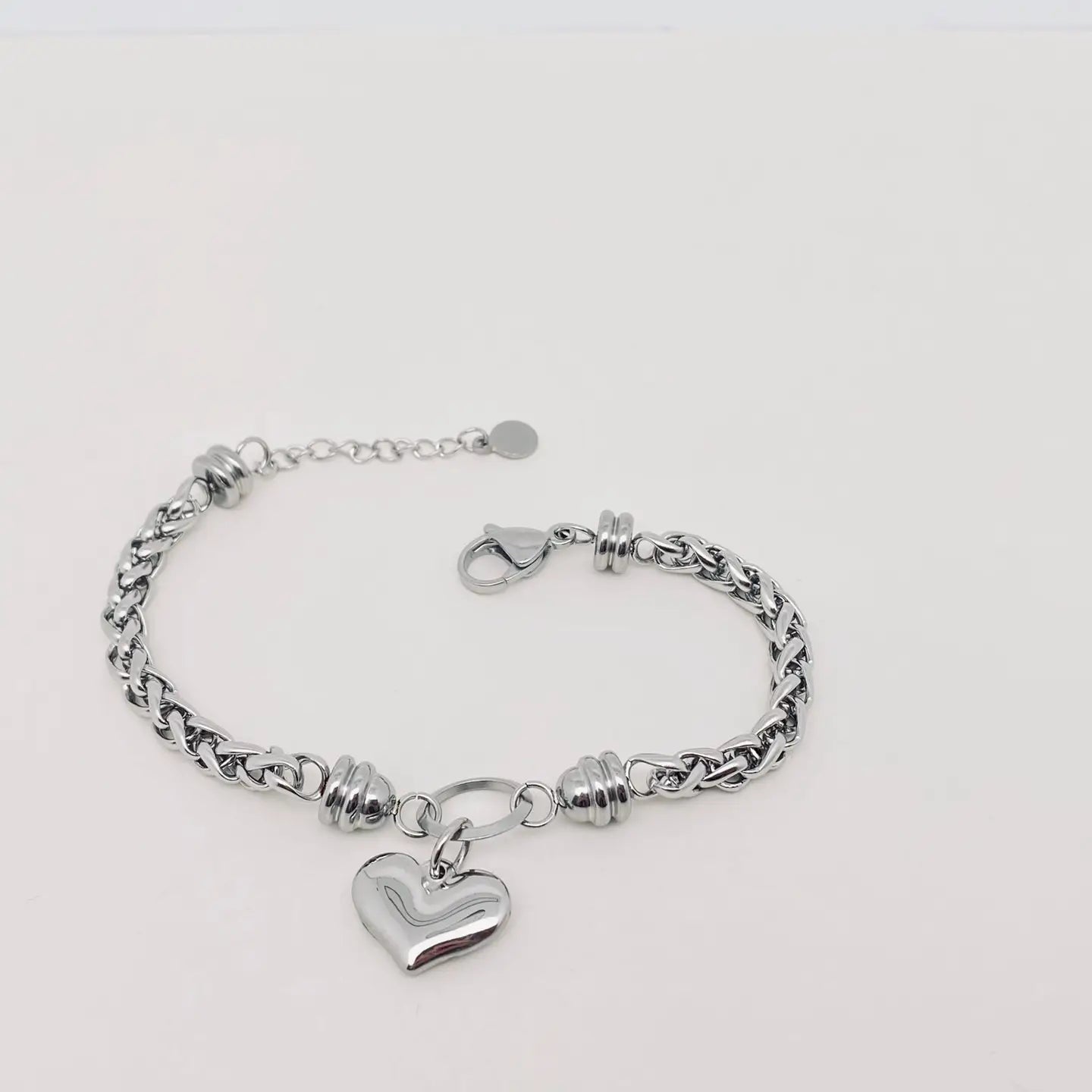 Bracciale "Cuore Intrecciato" in Acciaio Inossidabile – Eleganza e Resistenza