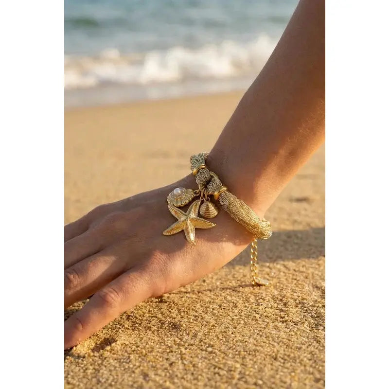 Bracciale "Incanto Marino" – Bracciale Corda Dorato in Acciaio Inossidabile con Ciondoli Marini e Stella Marina