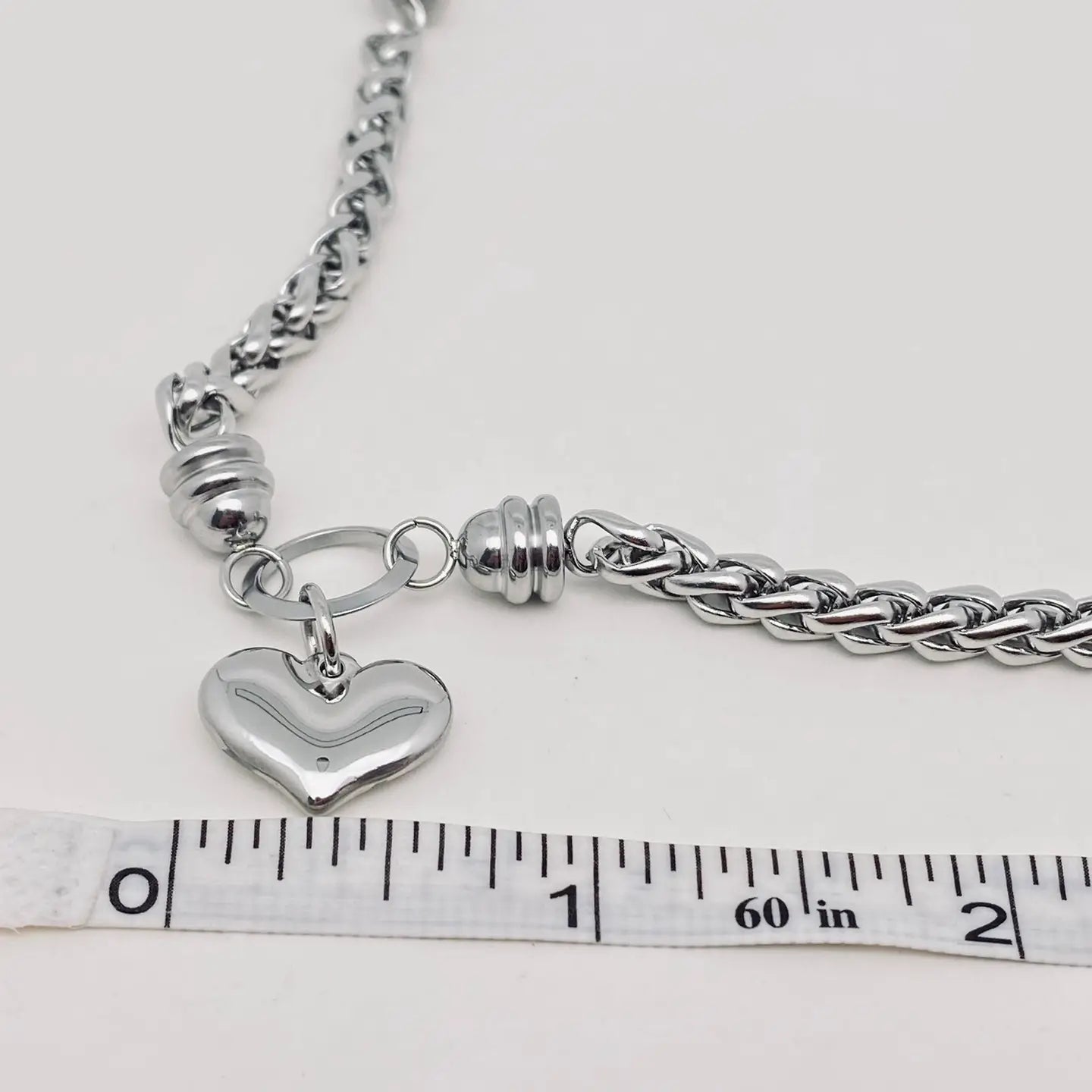 Bracciale "Cuore Intrecciato" in Acciaio Inossidabile – Eleganza e Resistenza