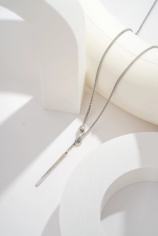 Collana Nodo Eterno in acciaio inossidabile oro/argento – collana minimal con pendente nodo e barra