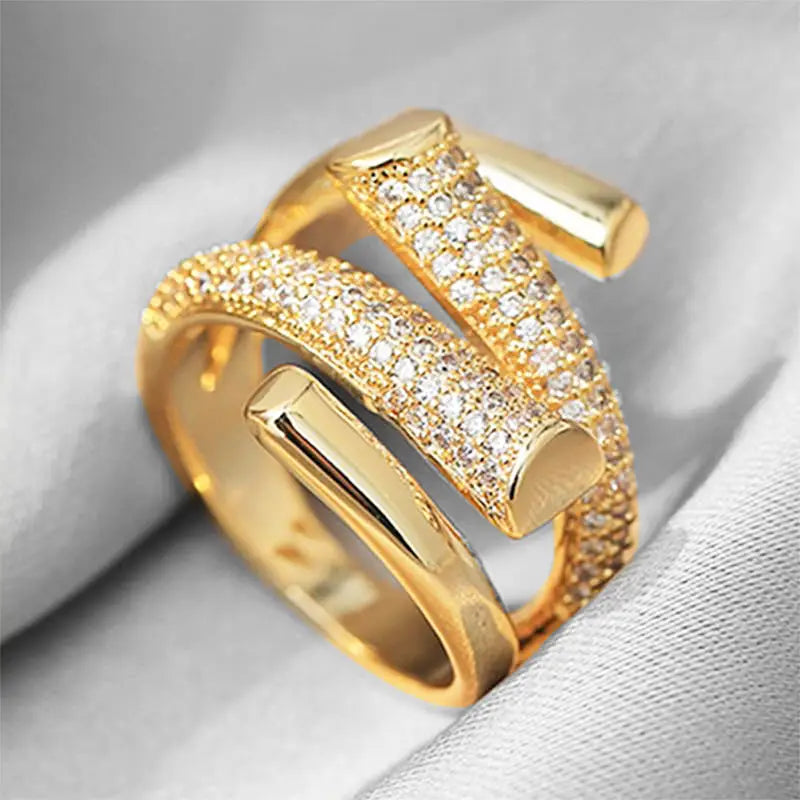 Anello Twist Pavé in Oro/Argento – Anello Intrecciato Elegante con Zirconi Brillanti