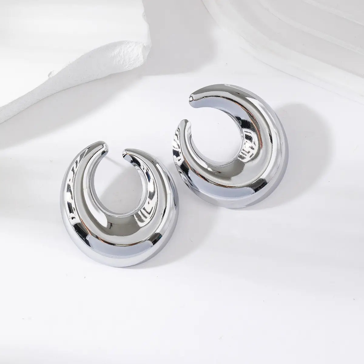 Luna Mirror – Orecchini Bold in Acciaio Lucido Effetto Specchio