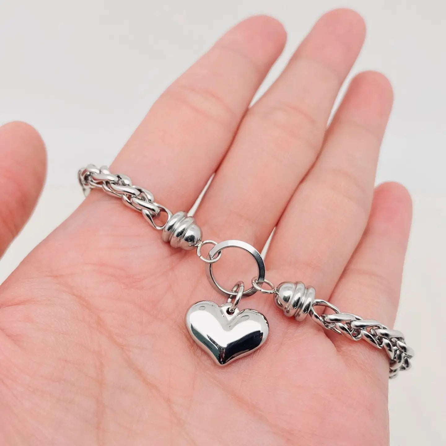 Bracciale "Cuore Intrecciato" in Acciaio Inossidabile – Eleganza e Resistenza