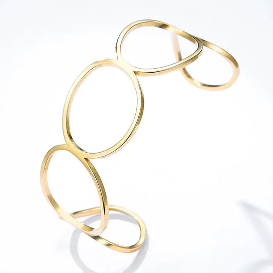 Bracciale Rigido OROA in Acciaio Inossidabile Dorato – Design Geometrico Moderno