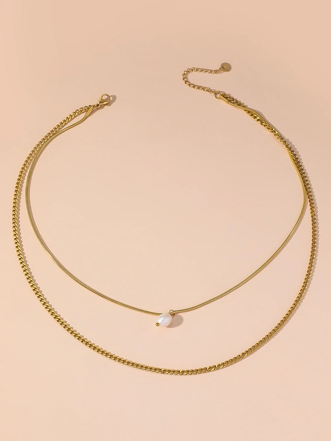 Collana Eterna con doppia catena in acciaio inossidabile e perla pendente